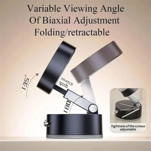 Black magnetic phone holder mounted on car windshield